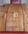 Character gapped live edge dining table