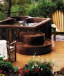 COPPER SPA WITH PRIVATE THERAPY SEAT, BENCH SEATING,  COOL DOWN AREA, EXTERIOR STAIRWAY AND RECYCLED BARN BOARD SKIRTING