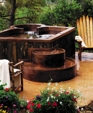 COPPER SPA WITH PRIVATE THERAPY SEAT, BENCH SEATING,  COOL DOWN AREA, EXTERIOR STAIRWAY AND RECYCLED BARN BOARD SKIRTING